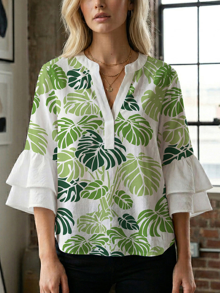 Women's blouse with voluminous wing sleeves and intense leaf pattern Lune London