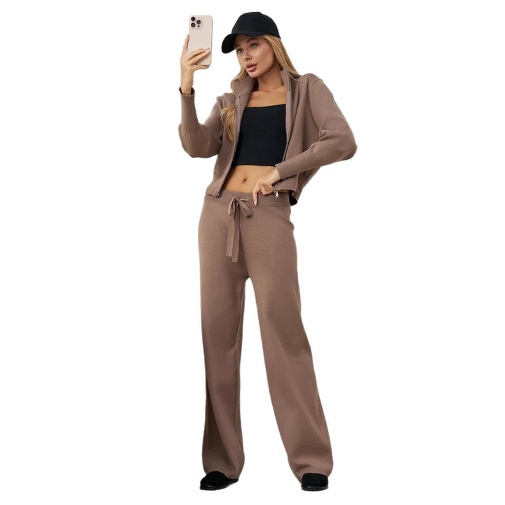 Ladies comfortable knit jumpsuit with high collar and side lace details Lune London