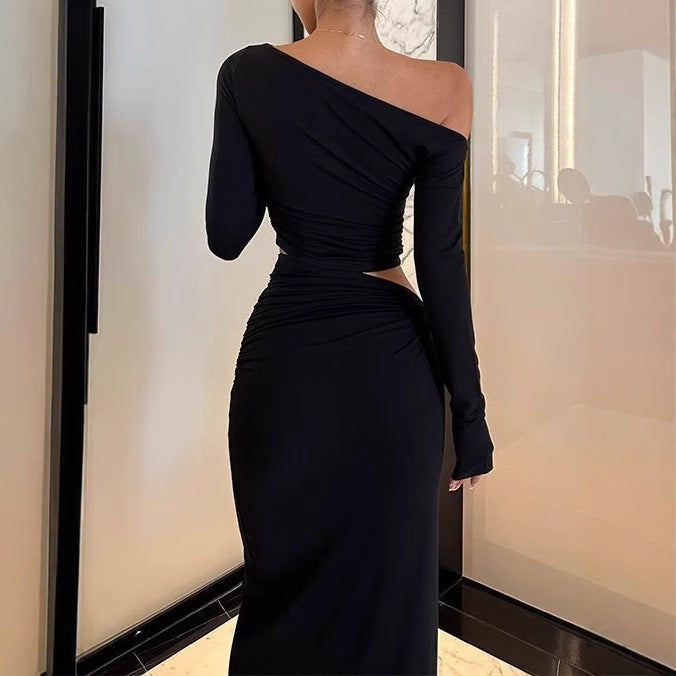 Long sleeve maxi dress for women with asymmetrical design and ruffled details Lune London