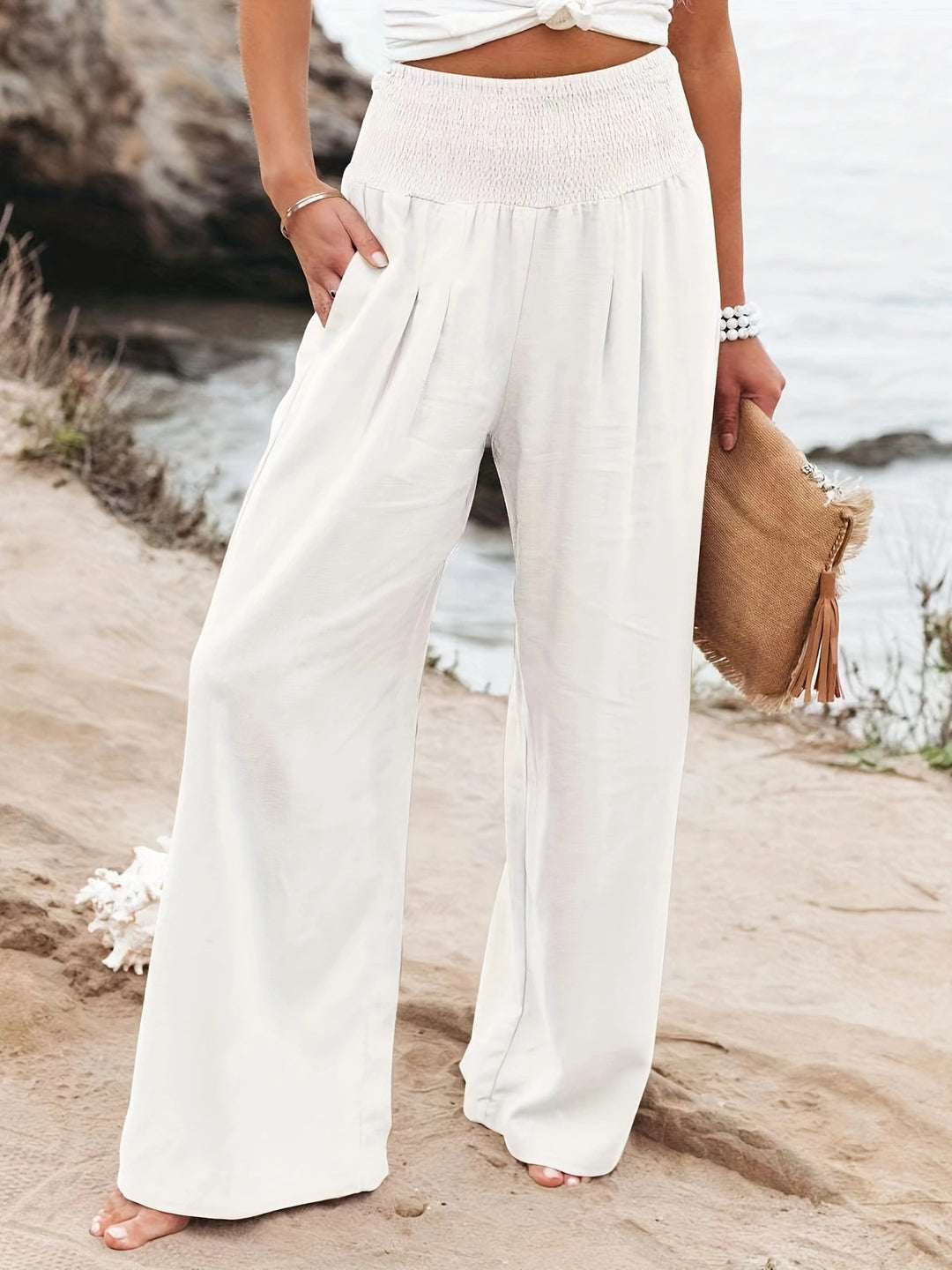 Loose summer pants for women with elastic waist and elegant draping Lune London