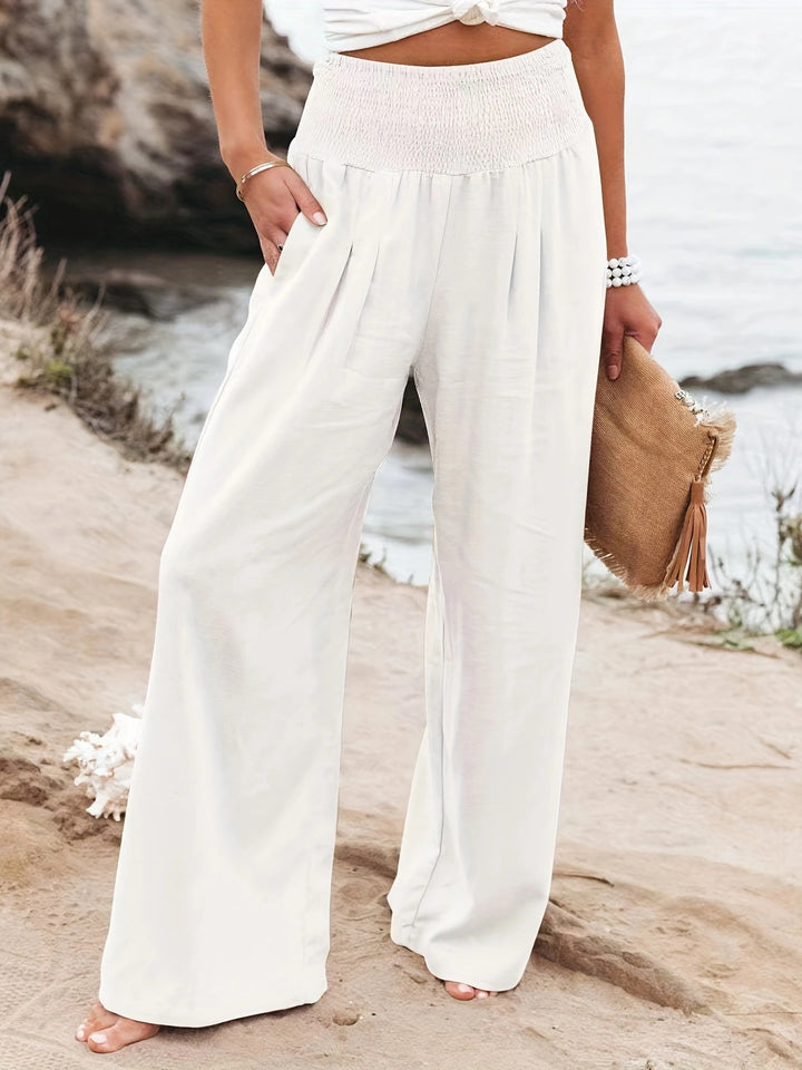 Loose summer pants for women with elastic waist and elegant draping Lune London