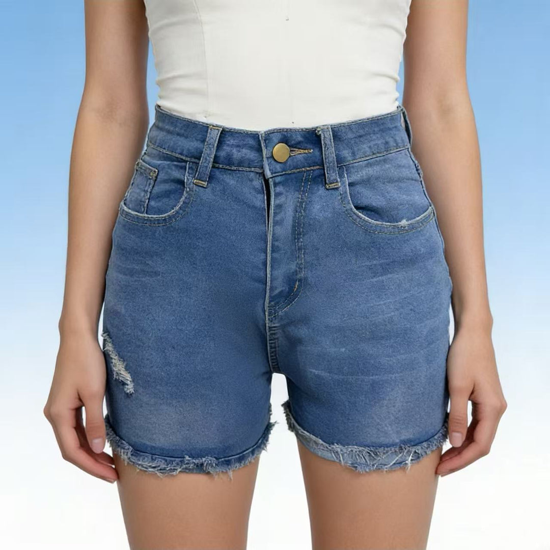 Women's casual high-waist denim shorts with fringe and trendy distressed details Lune London
