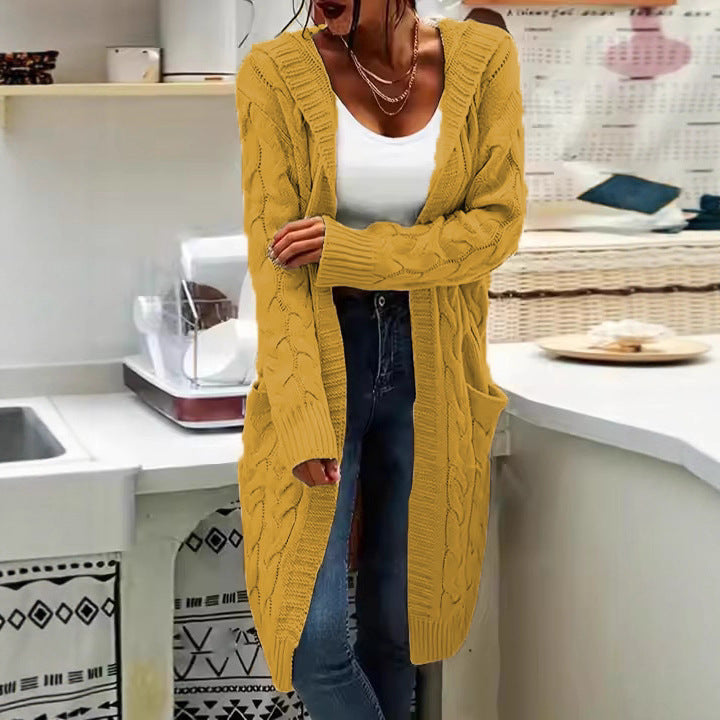 Ladies chunky knit cardigan with side pockets and structured cable design Lune London