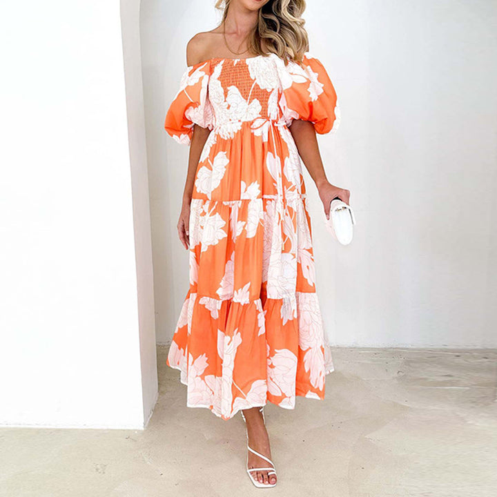 Robe Maxi pour femmes avec de volumineuses manches bouffantes et un design floral Chic & Stil