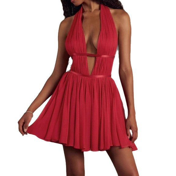 Elegant women's mini dress with deep V-neckline and refined ruffle details Lune London