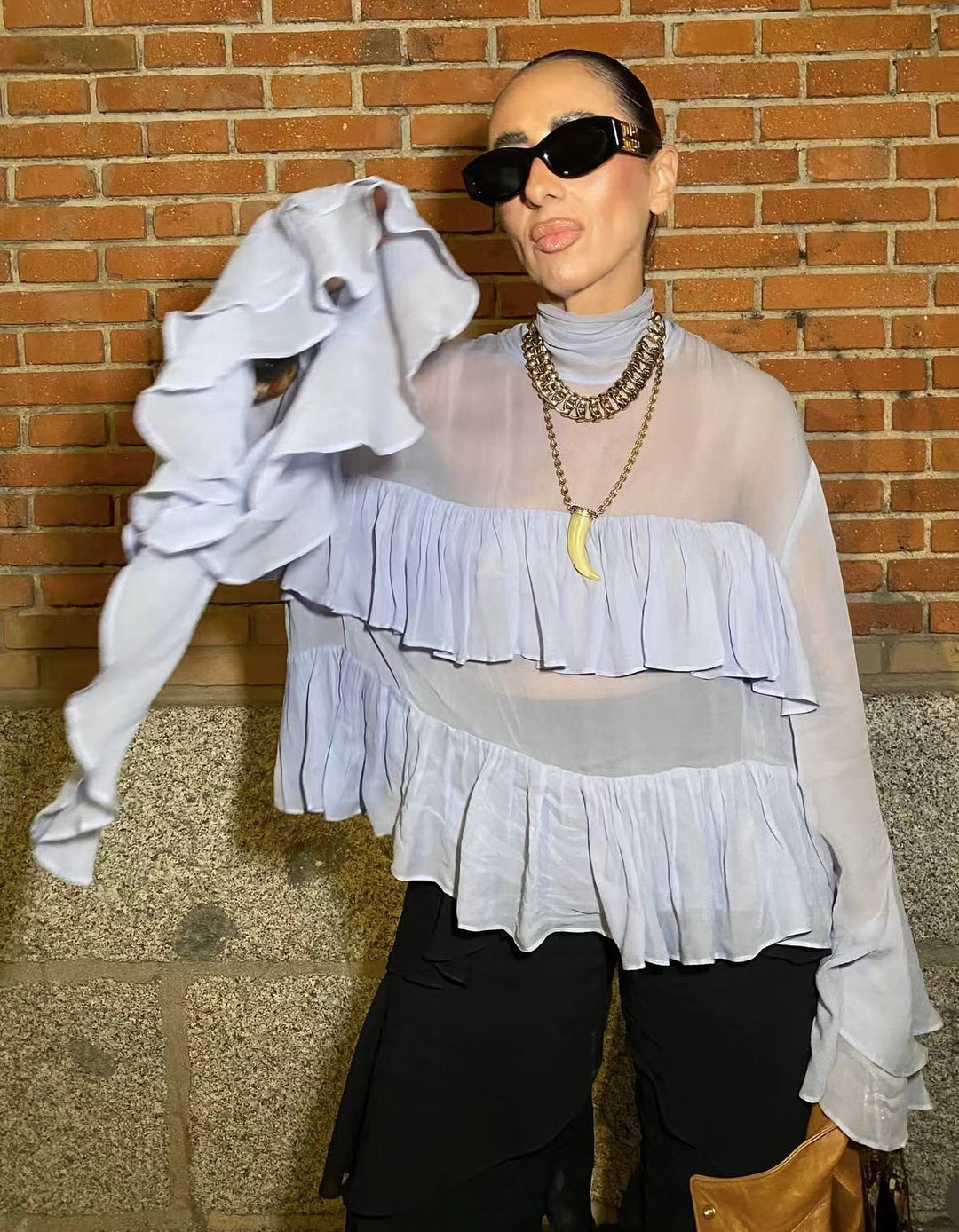 Fluid ruffled blouse for women with elegant details Lune London