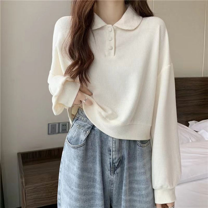 Pull polo décontracté pour femmes avec détails de boutons Chic & Stil