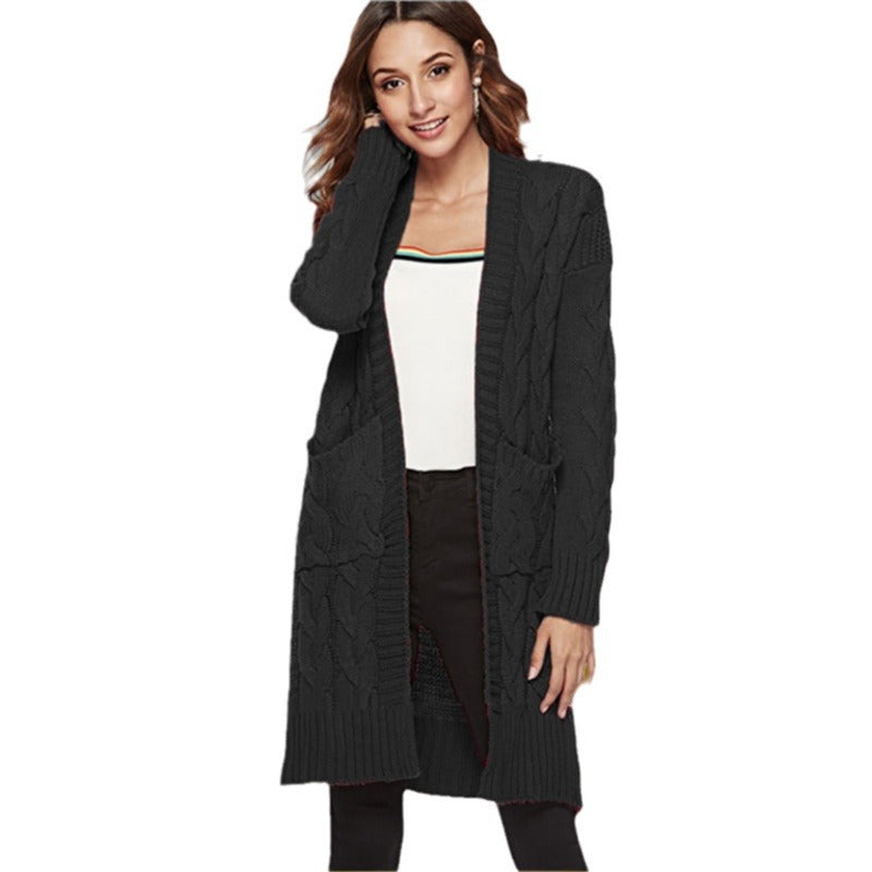 Ladies chunky knit cardigan with deep pockets and decorative relief pattern Lune London