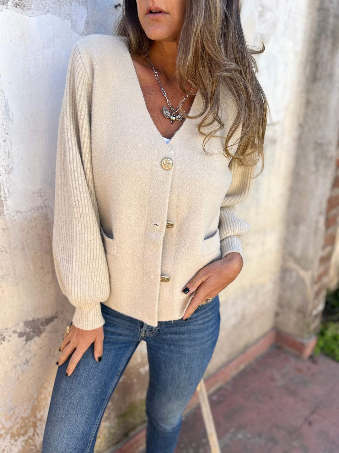 Ladies trendy knitted jacket with button details and pockets Lune London