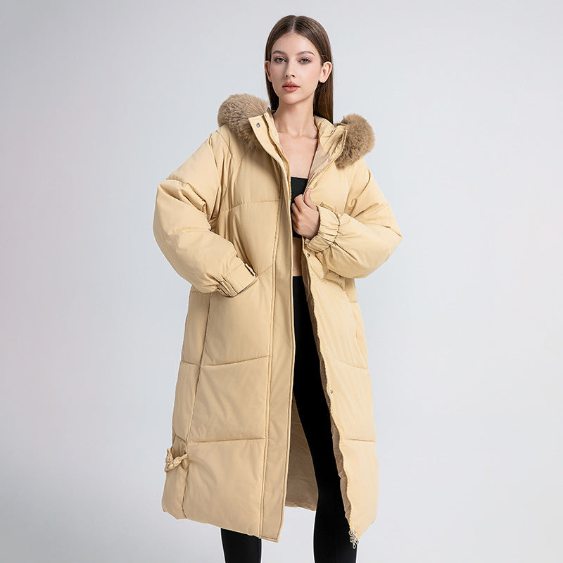 Long winter coat for women lined with removable faux fur collar and practical drawstrings Lune London