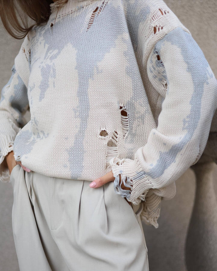 Casual oversized sweater for women with trendy ripped details and a creative color gradient Lune London