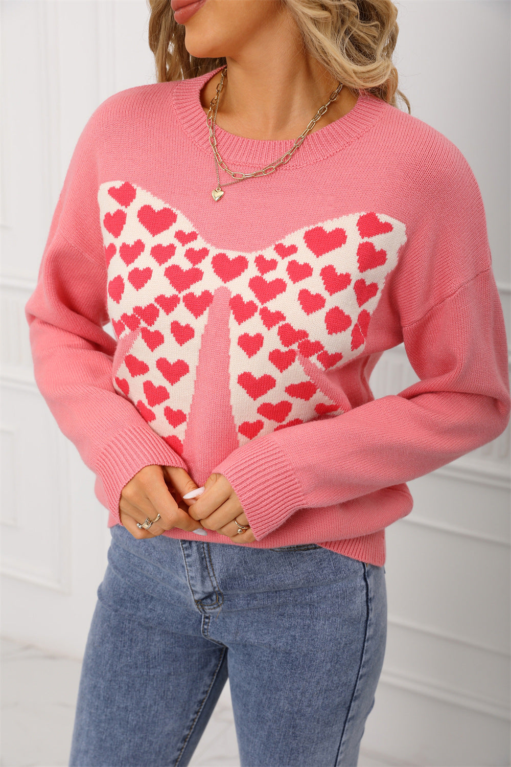 Knitted sweater for women with playful heart pattern Lune London