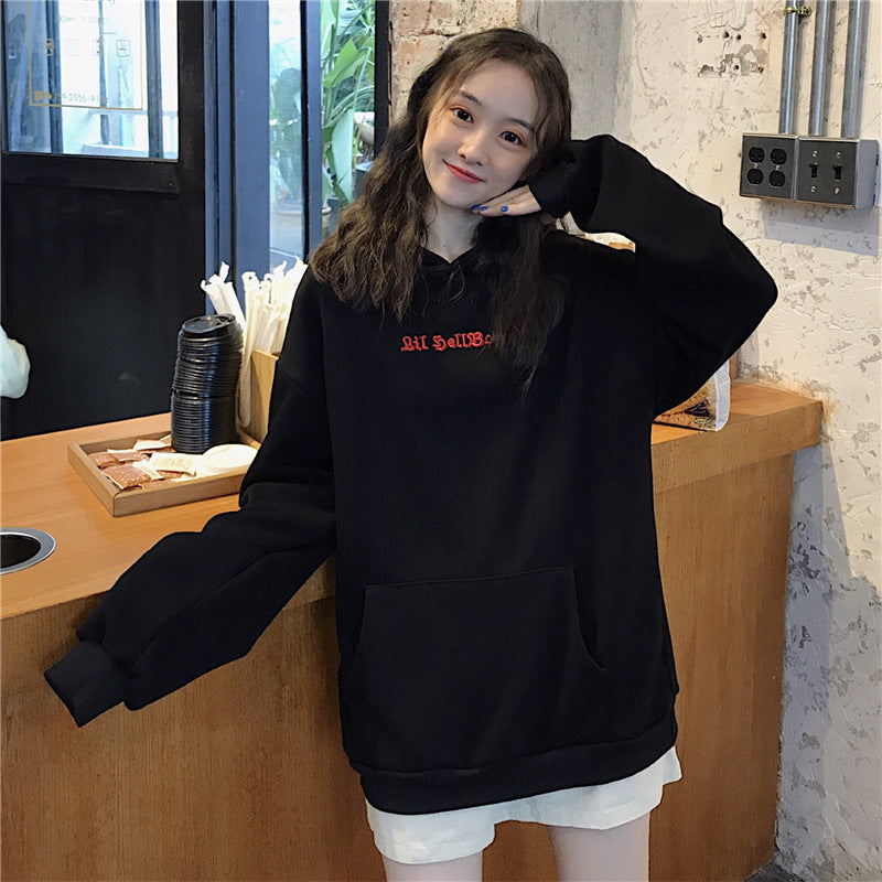 Women's oversized hoodie with playful wing appliqués Chic & Stil