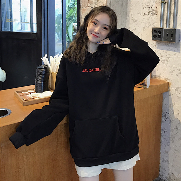 Women's oversized hoodie with playful wing appliqués Chic & Stil