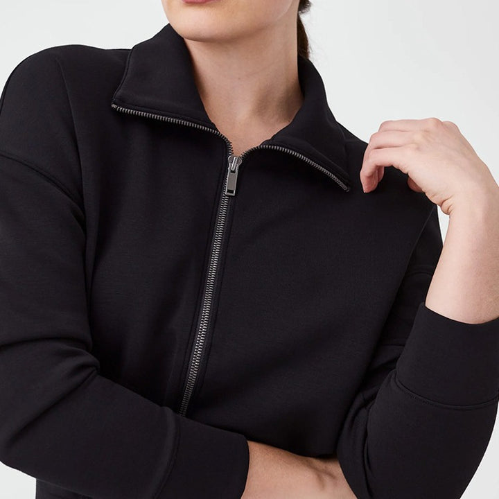 Ladies Luxurious Lounge Jumpsuit with elegant high collar and convenient zipper Lune London