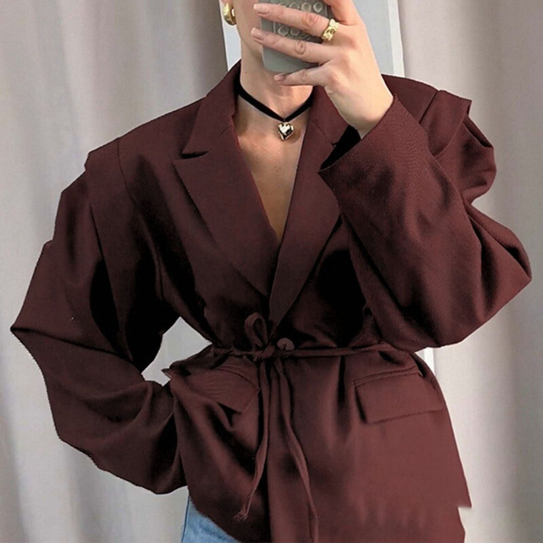 Blazer surdimensionné pour femmes avec ceinture à la taille et élégantes manches bouffantes Chic & Stil