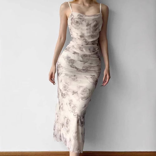 Maxi fitted dress for women with refined ruffles and a floral pattern Lune London