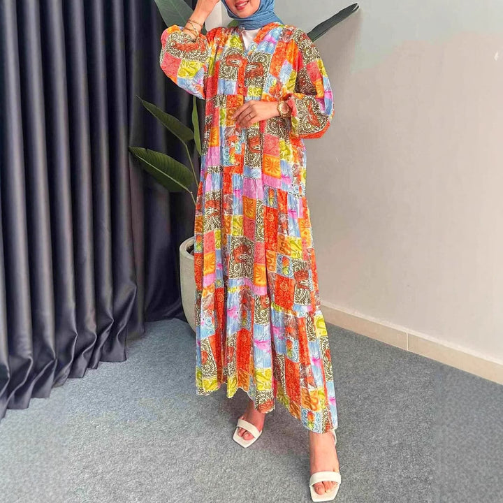 Maxi dress for women in boho style with a colorful patchwork design and wide sleeves Lune London