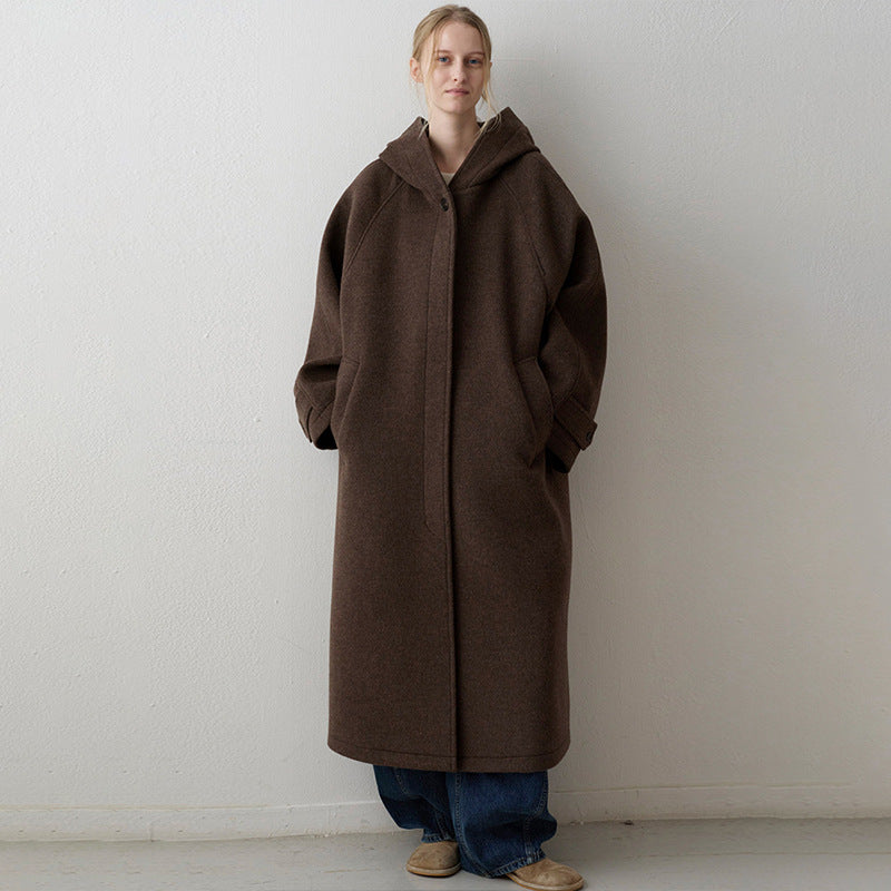 Manteau en laine surdimensionné pour femmes avec capuche et poches pratiques Chic & Stil
