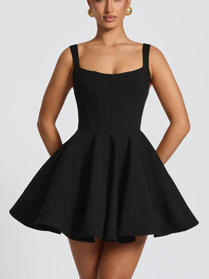 Women's cocktail dress with oversized bow design and flowing skirt Lune London