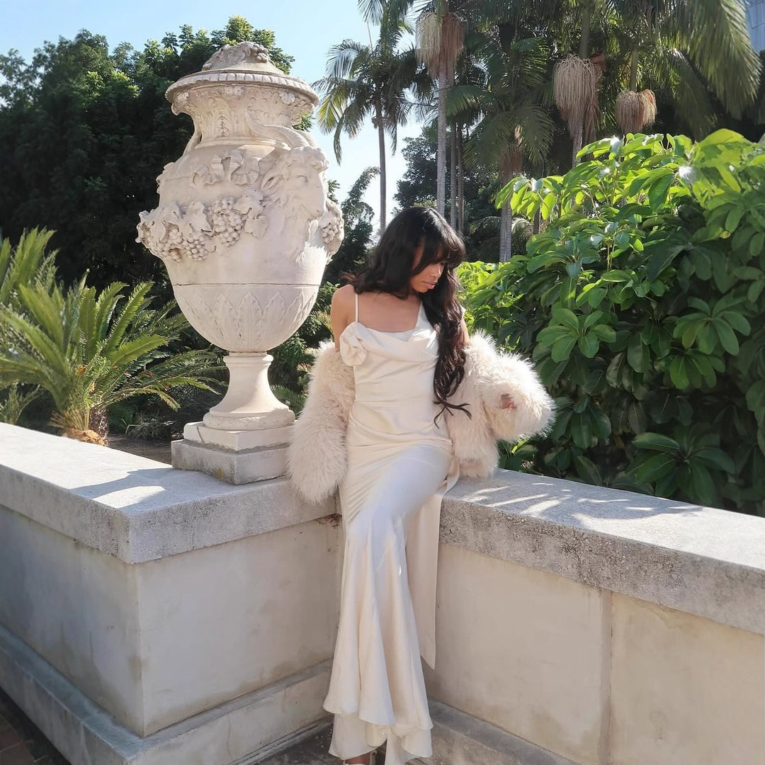 Maxi dress for women with asymmetric cut and elegant ruffle detail Lune London