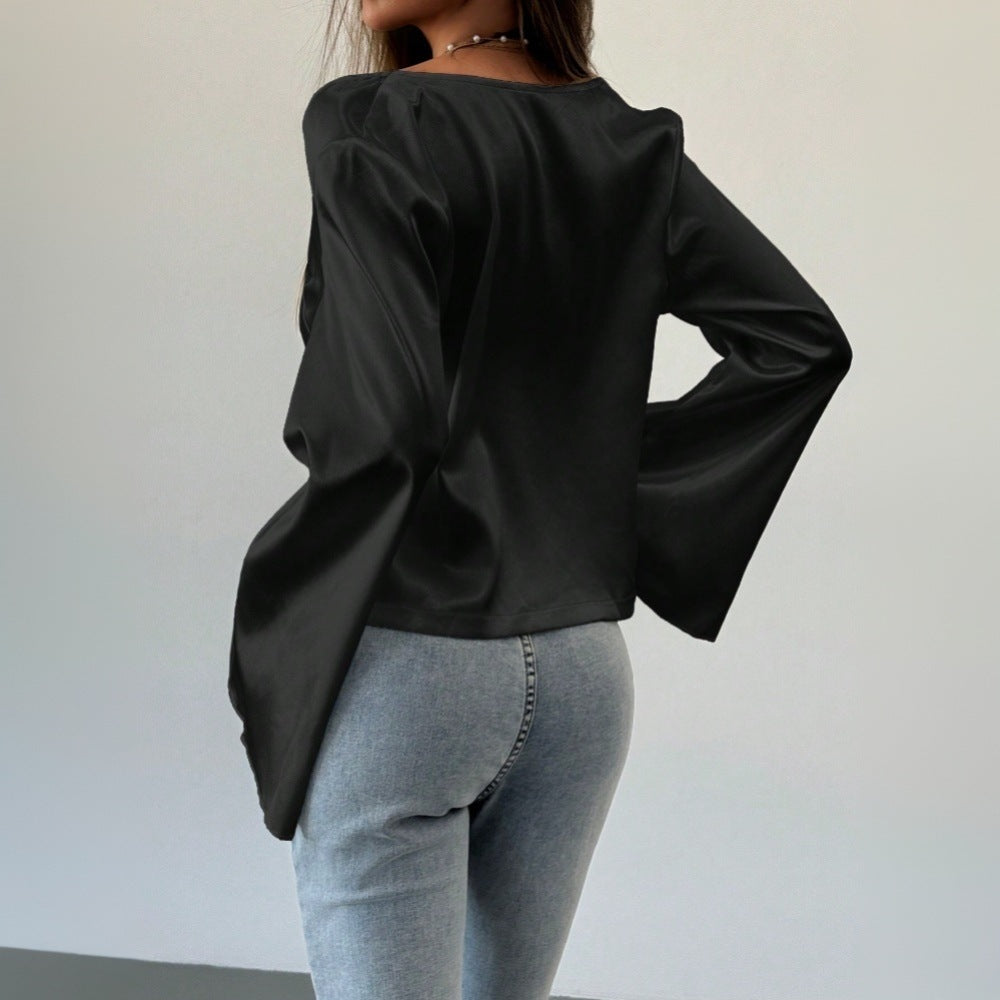 Elegant blouse for women with a deep V neckline and a casual knot detail Chic & Stil