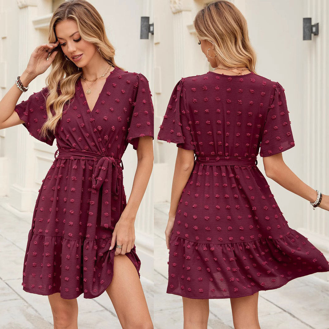 V neck wrap dress for women with a belt at the waist and textured fabric Lune London