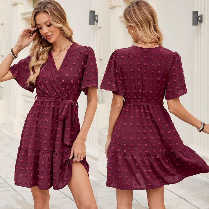 V neck wrap dress for women with a belt at the waist and textured fabric Lune London