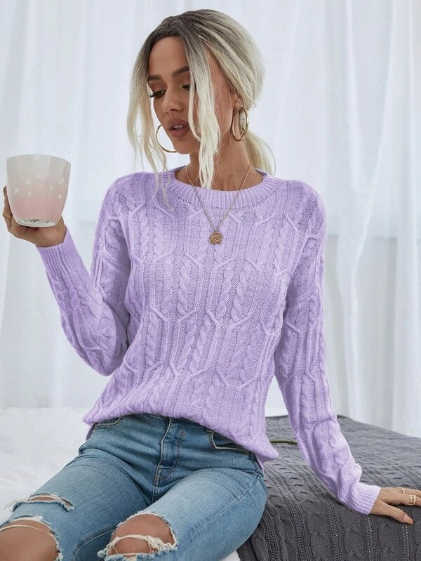 Ladies knit sweater with cable pattern demanding Lune London