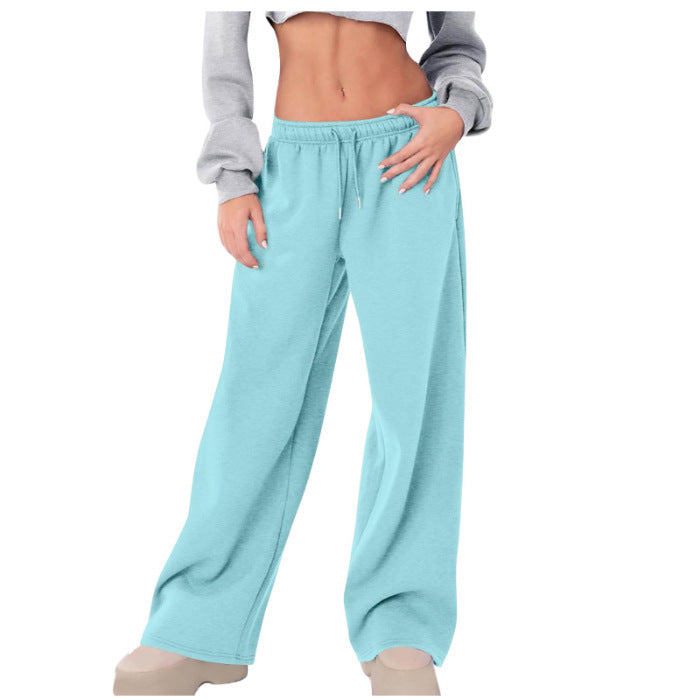 Women's loose casual pants with elastic waistband and side pockets Chic & Stil