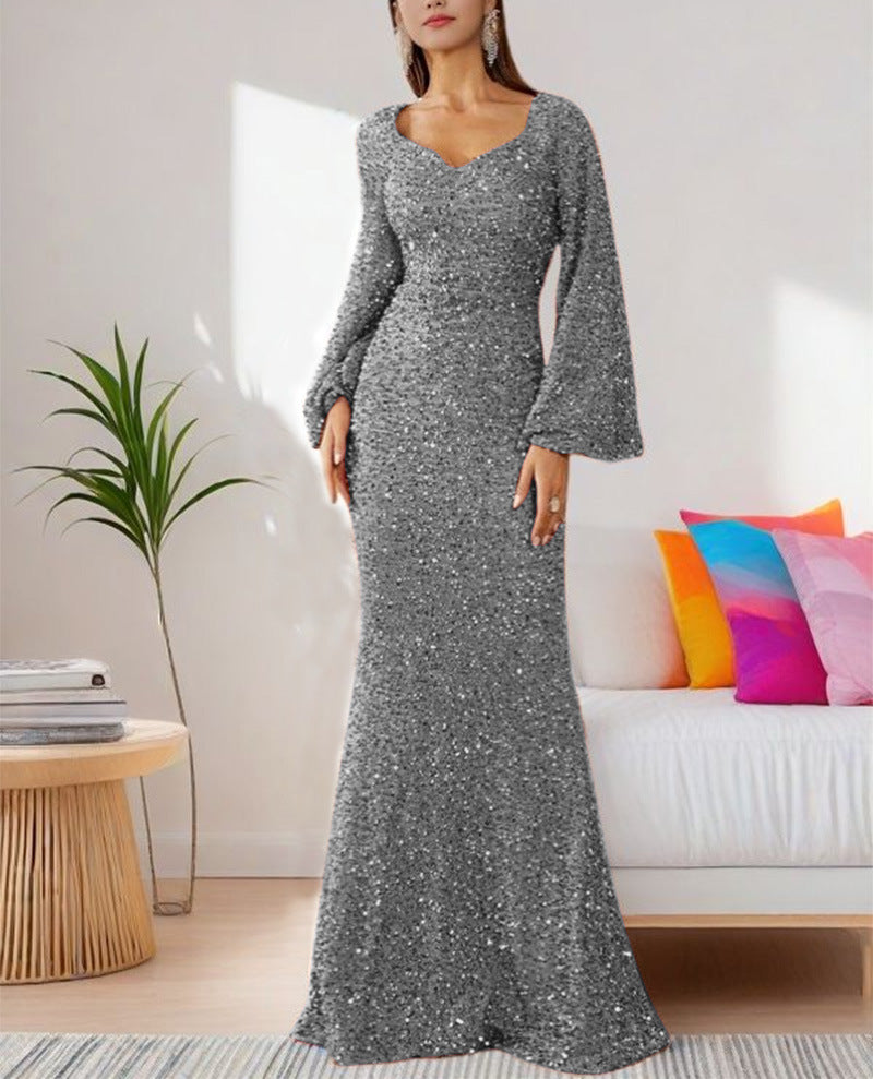 Ladies Glamorous Glitter Evening Dress with Swinging Skirt and Voluminous Sleeves Lune London