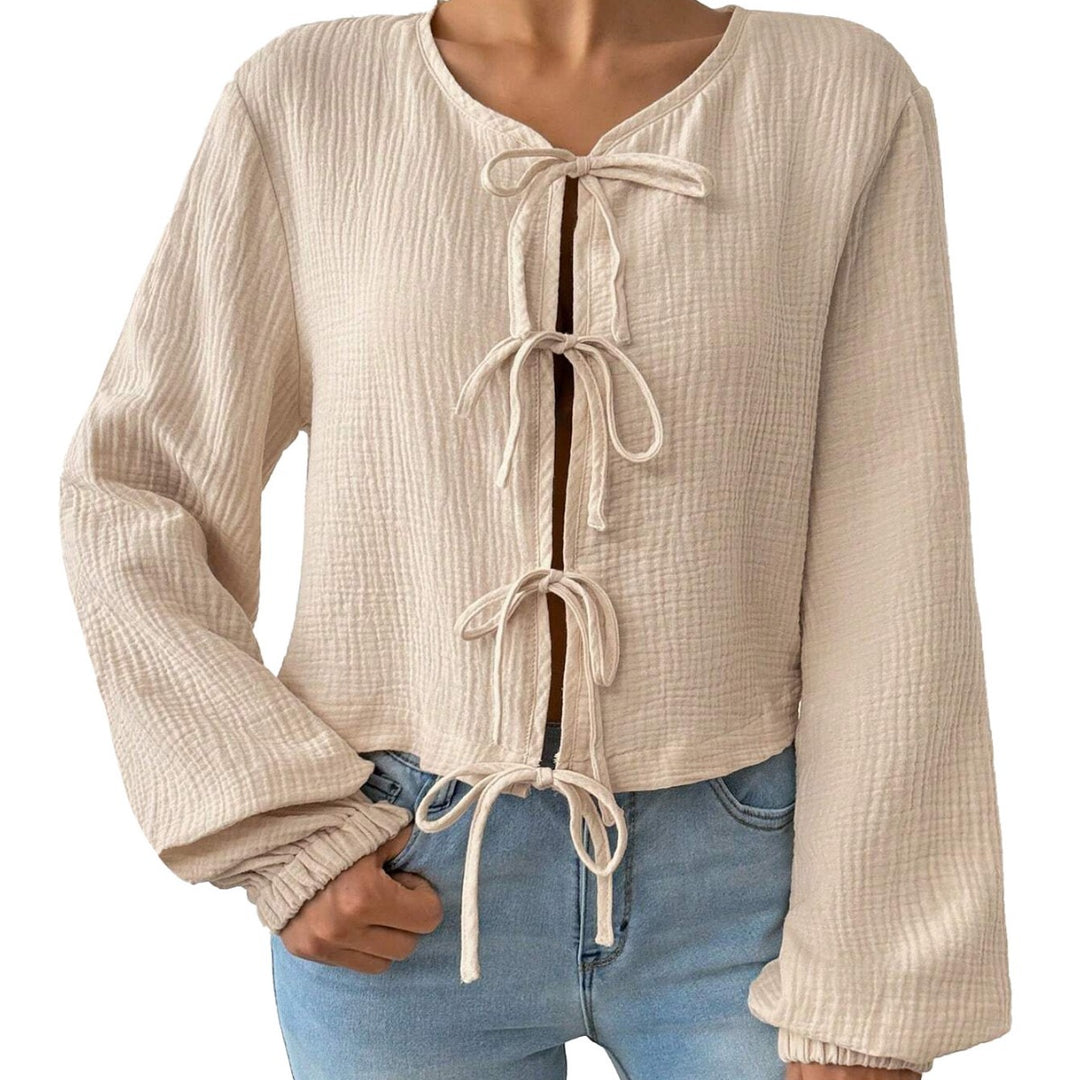 Short blouse top for women with sophisticated lace-up details Chic & Stil