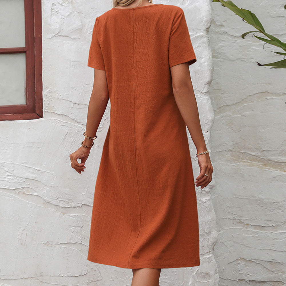 Casual midi dress for women with practical pockets and chic side panels