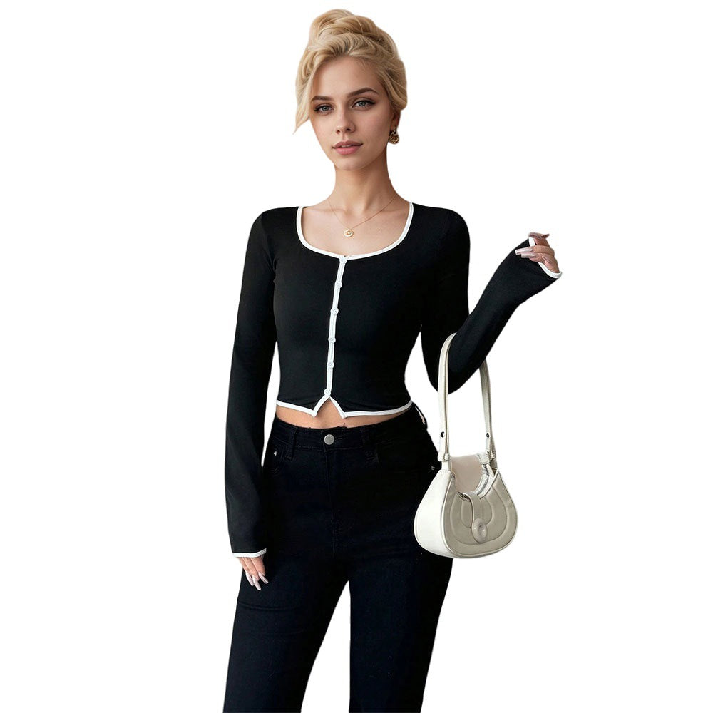Chic & Stil cropped long sleeve women's shirt with a fine button design and a contrasting hem