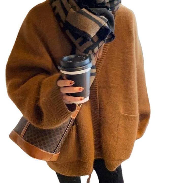 Cardigan surdimensionné pour femmes en tricot avec poches profondes et détails texturés Chic & Stil