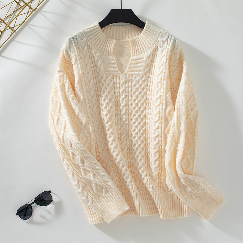 Fashionable women's knitted sweater with a unique cable design and a chic round neck. Lune London