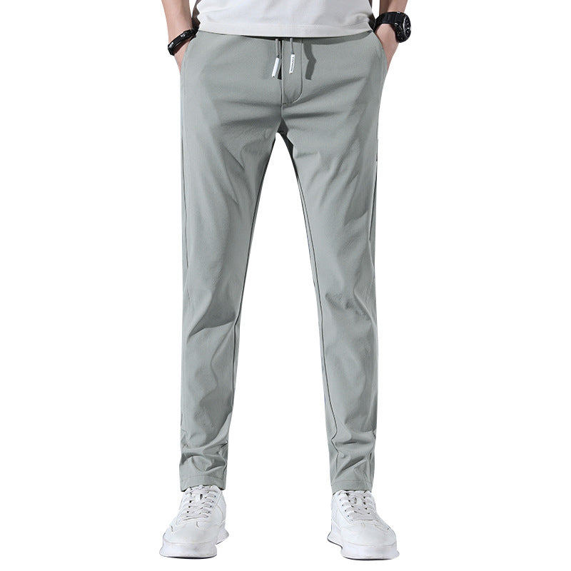 Sports jogger pants for men with elastic waist and practical zip pockets Lune London