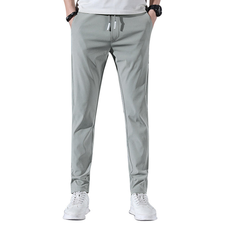 Sports jogger pants for men with elastic waist and practical zip pockets Lune London