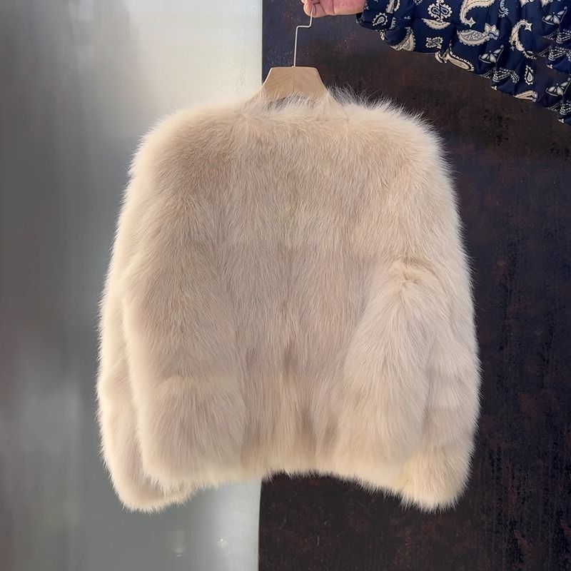 Veste élégante en fausse fourrure pour femmes avec coupe courte Chic & Stil
