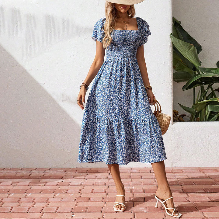 Robe midi femme avec imprimé floral et manches bouffantes aériennes Chic & Stil