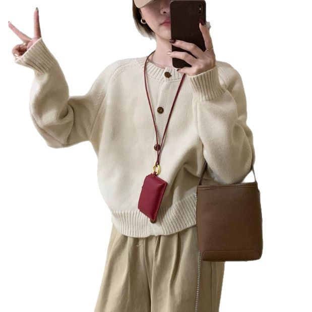 Comfortable knit sweater for women with button details and dropped shoulders Lune London