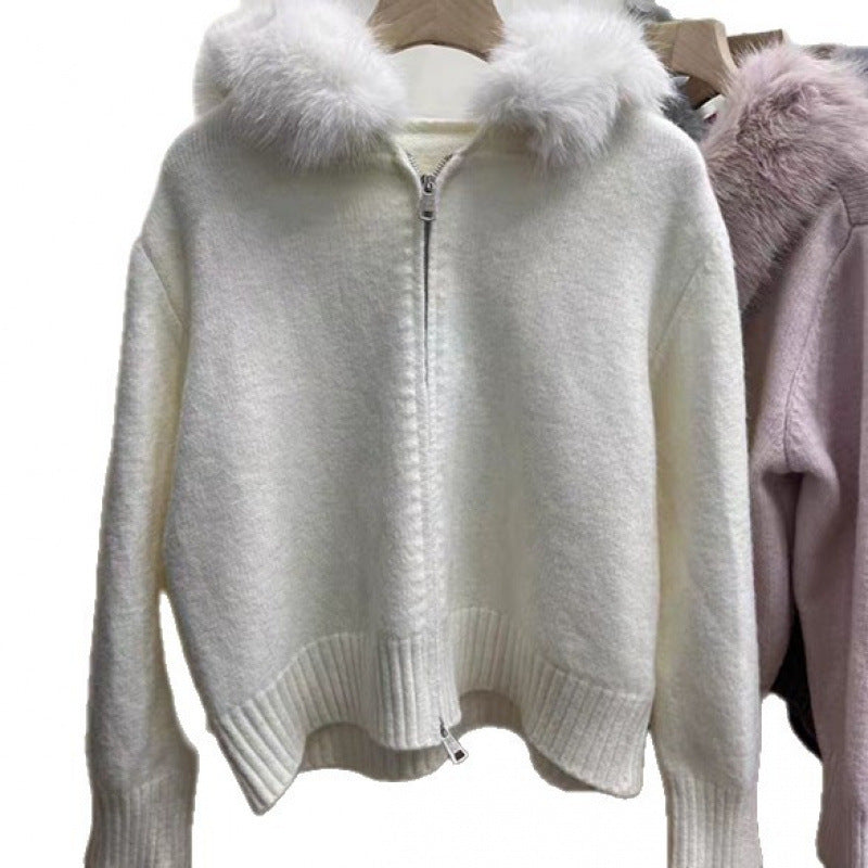 Haut à capuche pour femmes avec un col en fourrure luxueux et des poches pratiques Chic & Stil
