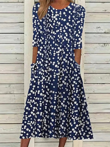 Elegant midi dress for ladies with floral design and pockets Lune London
