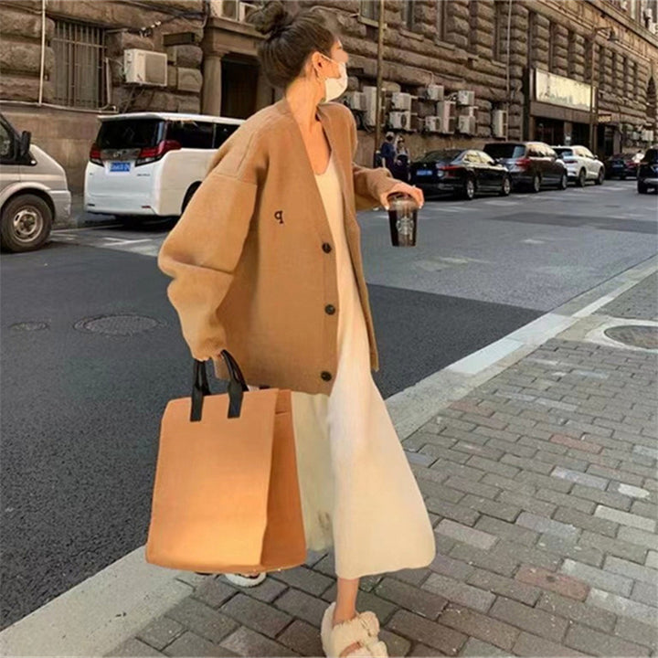 Gilet oversize pour femmes avec col tendance et poches pratiques Chic & Stil