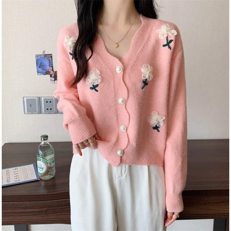 Playful women's cardigan button with floral embroidery and pearl buttons Lune London