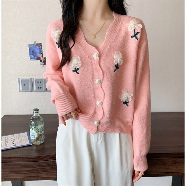 Playful women's cardigan button with floral embroidery and pearl buttons Lune London
