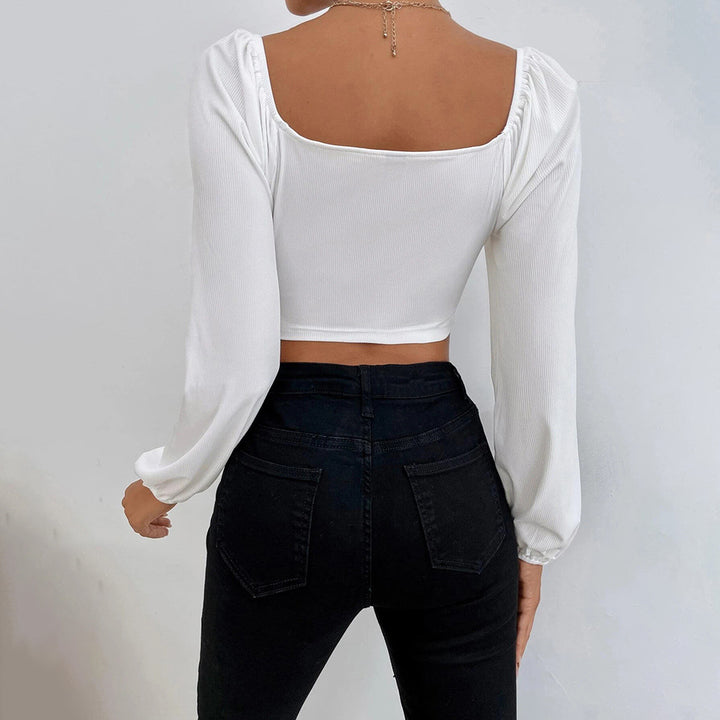 Chic & Stil Elegant puff sleeve design women's crop top with fitted silhouette