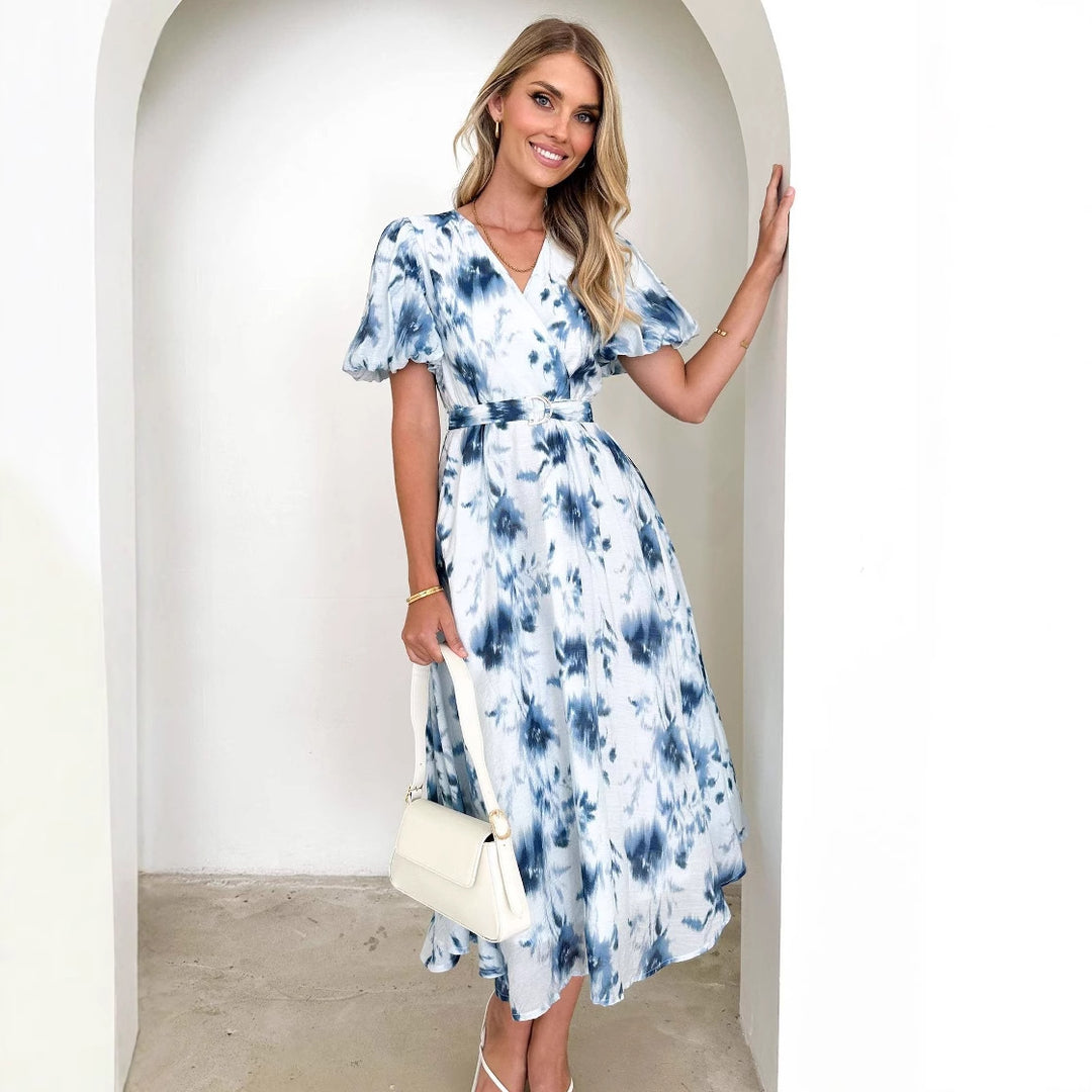 Midi dress for women with a playful wrap design and floral accents Chic & Stil