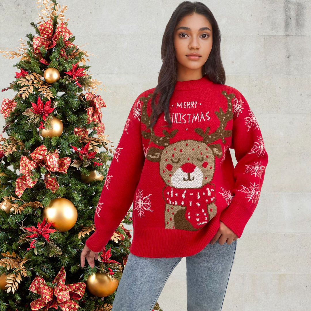 Christmas sweater for women with a cute reindeer pattern and winter snowflakes Lune London