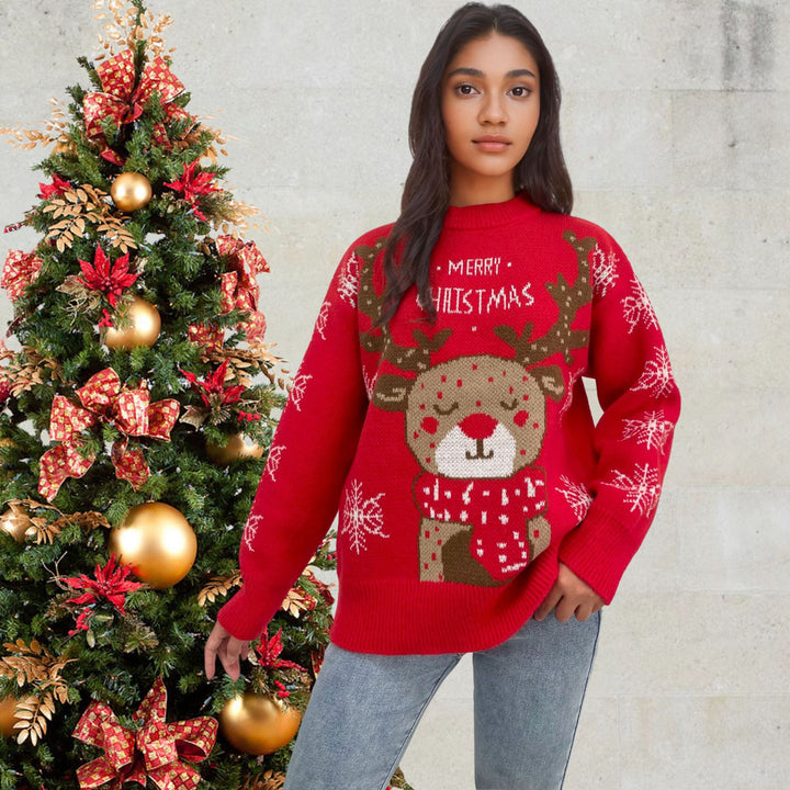 Christmas sweater for women with a cute reindeer pattern and winter snowflakes Lune London